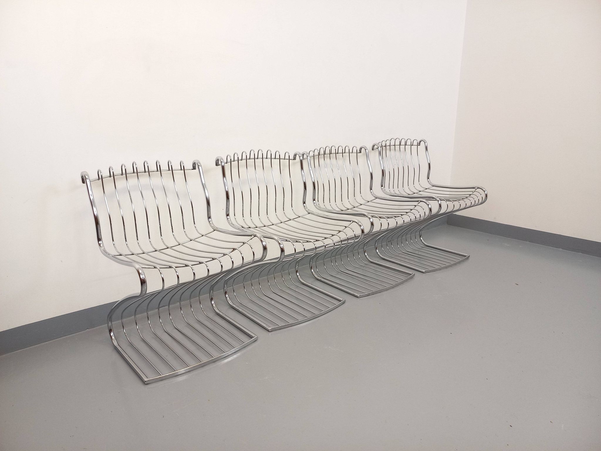 Set of 4 vintage Italian chairs by Gastone Rinaldi in chrome metal.