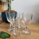 4 small glasses on foot with crystal liquor