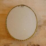 Oval frame bouquet of dried flowers with curved glass