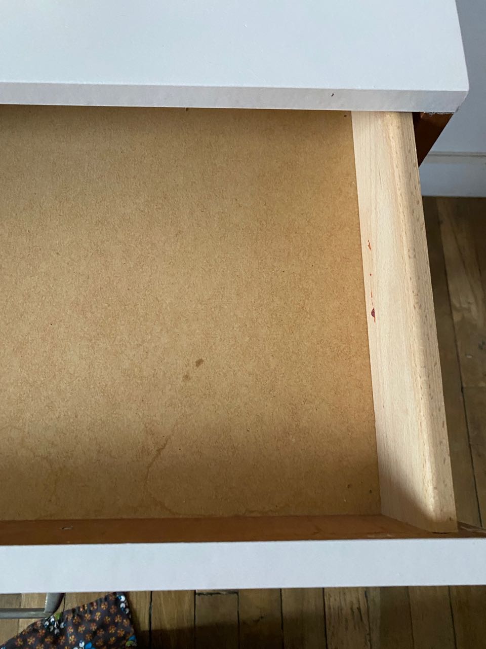 Wooden bedside table and nude