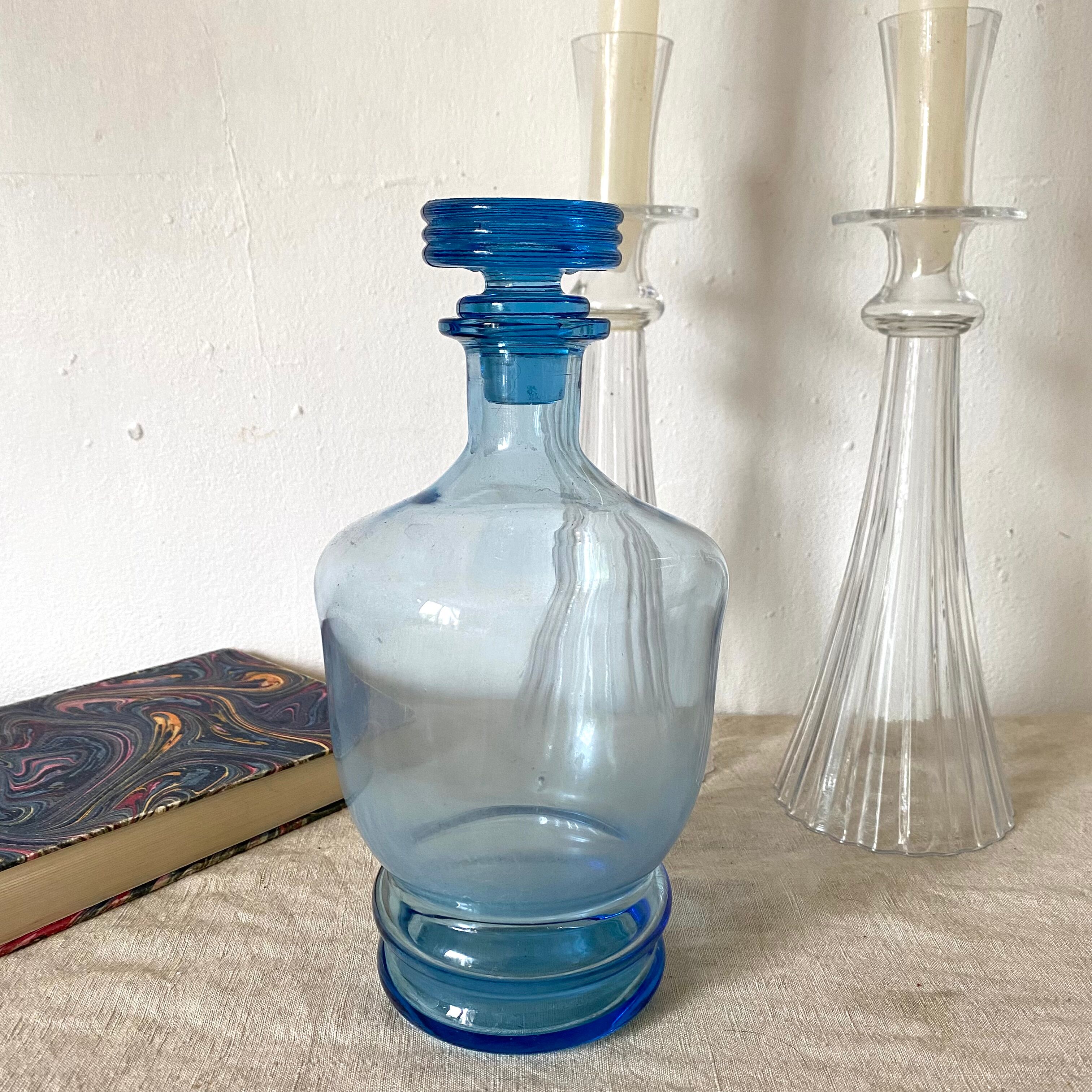 Antique carafe in blue glass