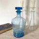 Carafe ancienne en verre bleu