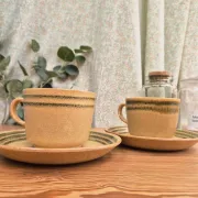 Two vintage Sarreguemines stoneware breakfast cups.