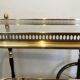 Rolling table in brass and mahogany with removable trays