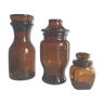 Trio of vintage amber glass apothecary jars