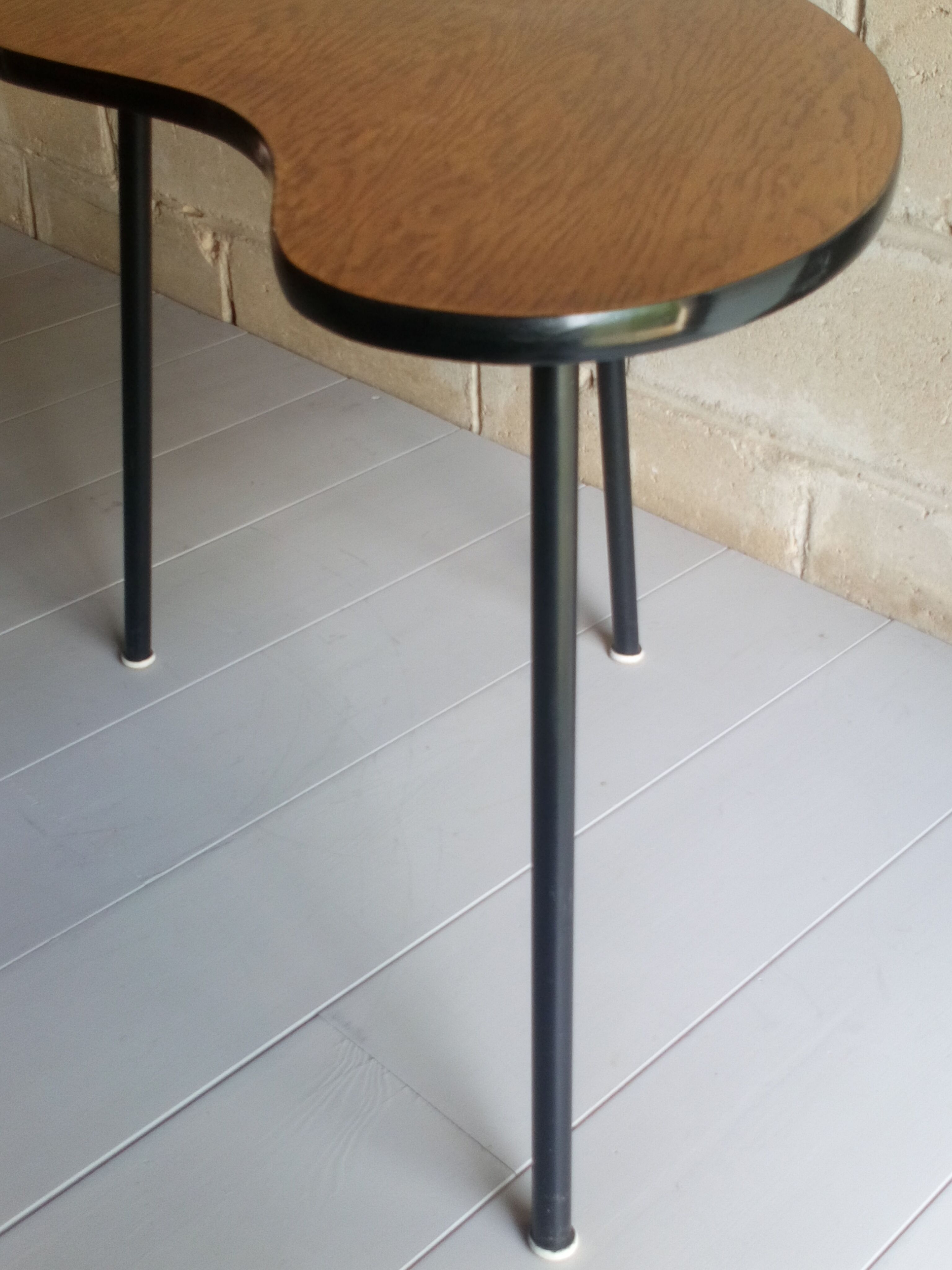 Scandinavian side table shaped bean with three feet