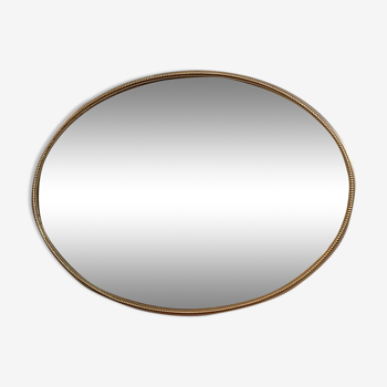 Oval mirror metal patinated pearl art deco