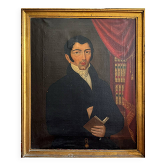 Portrait d’un gentilhomme dans sa bibliothèque