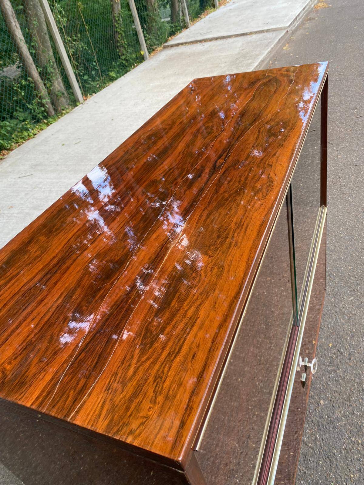 Scandinavian high buffet display cabinet in rosewood from the 1950s.