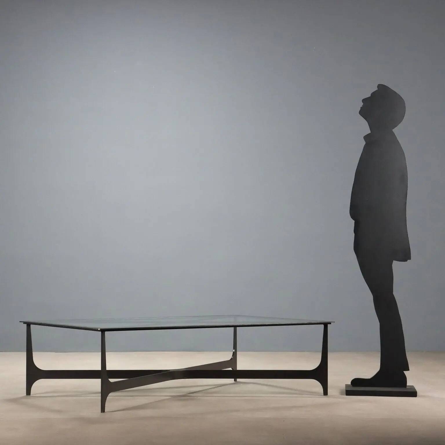 Small antique coffee table in black lacquered iron and glass, Italy, 20th century.