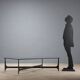 Small antique coffee table in black lacquered iron and glass, Italy, 20th century.