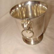 silver-plated ice bucket "with lion heads" from the 1970s