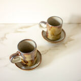 Pair of stoneware cups and sub-cups