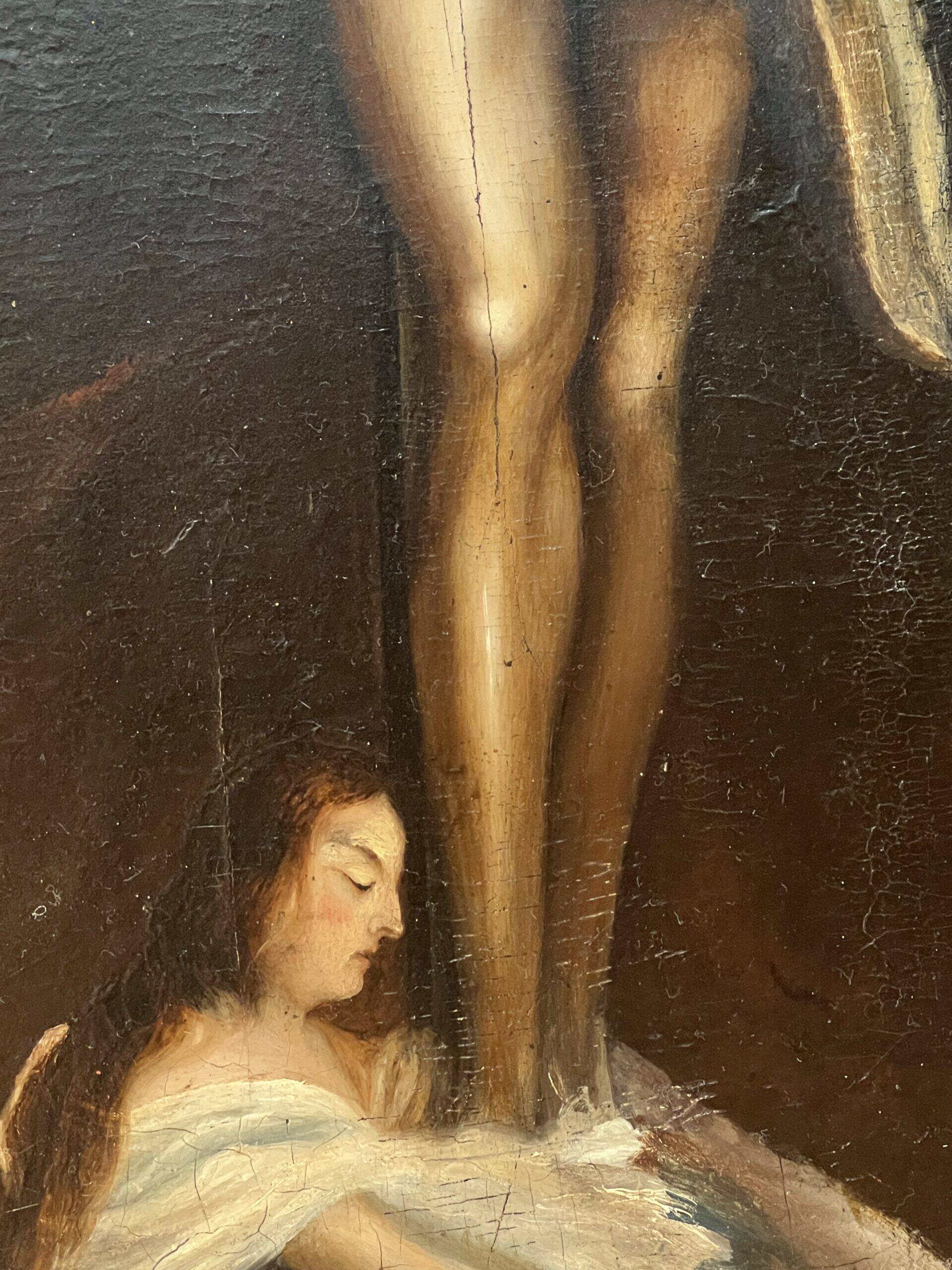 Beautiful religious work from the 17th century, oil on panel representing Christ on his cross with Mary Magdalene at his feet