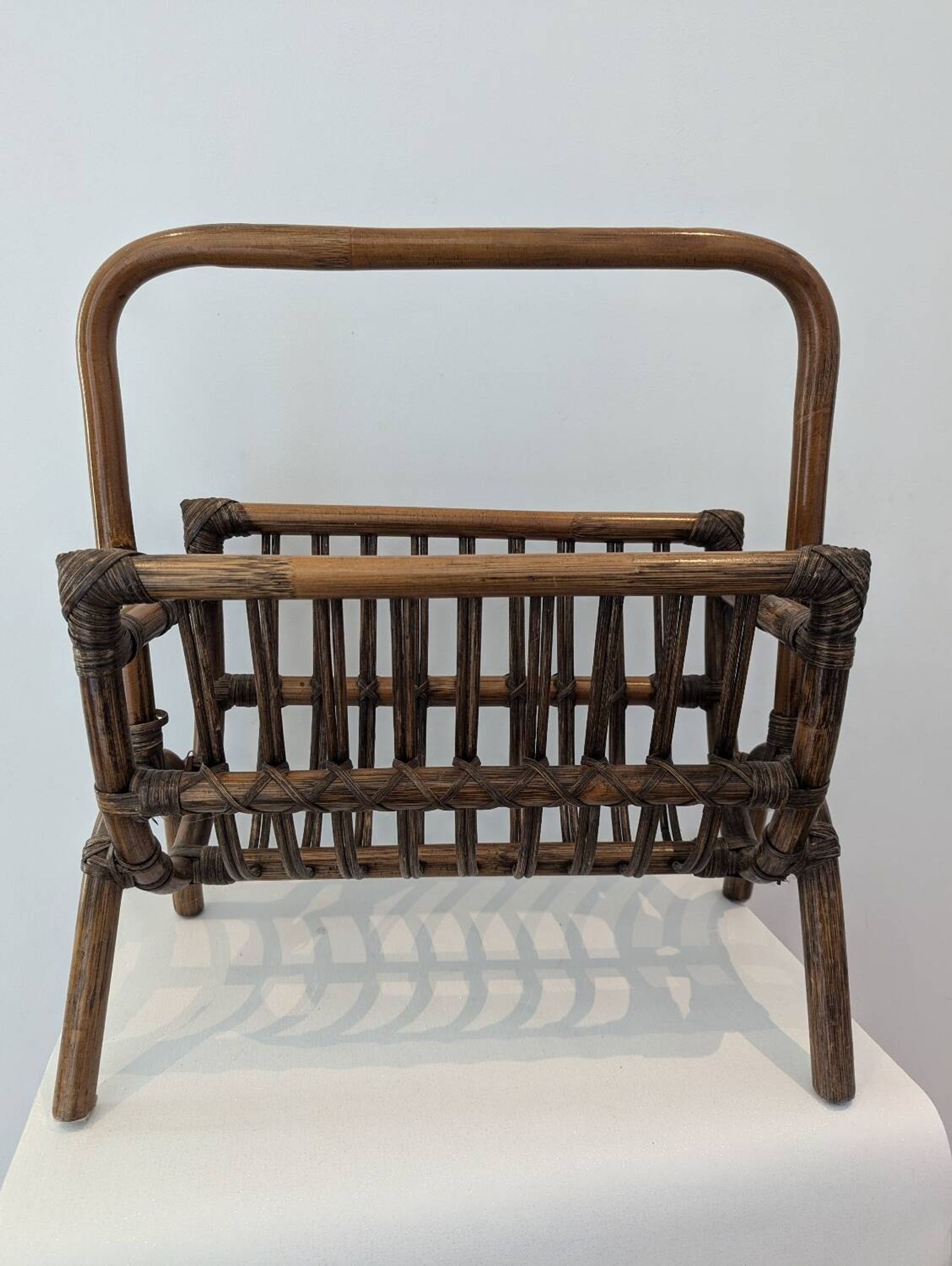 Vintage rattan magazine rack