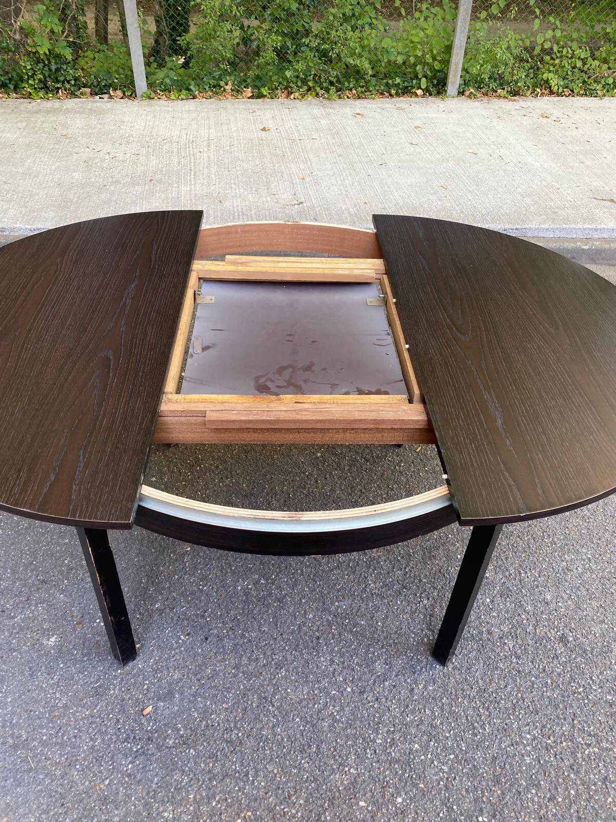 Contemporary round extendable Scandinavian dining table in wenge 1990
