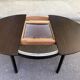 Contemporary round extendable Scandinavian dining table in wenge 1990