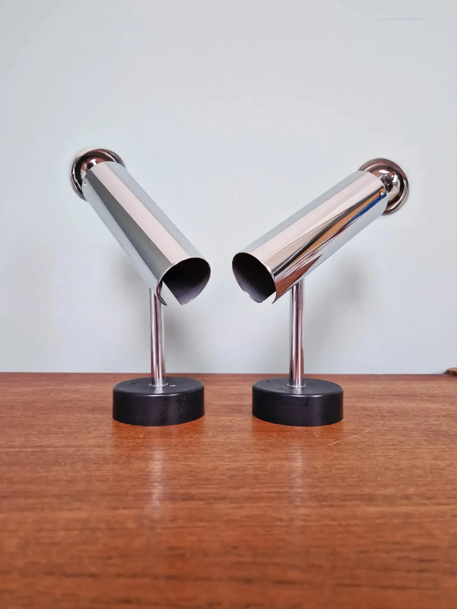 Pair of chrome metal wall lights, Staff Leuchten, Germany, 1970.