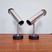 Pair of chrome metal wall lights, Staff Leuchten, Germany, 1970.