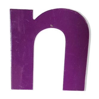 Purple letter "N"
