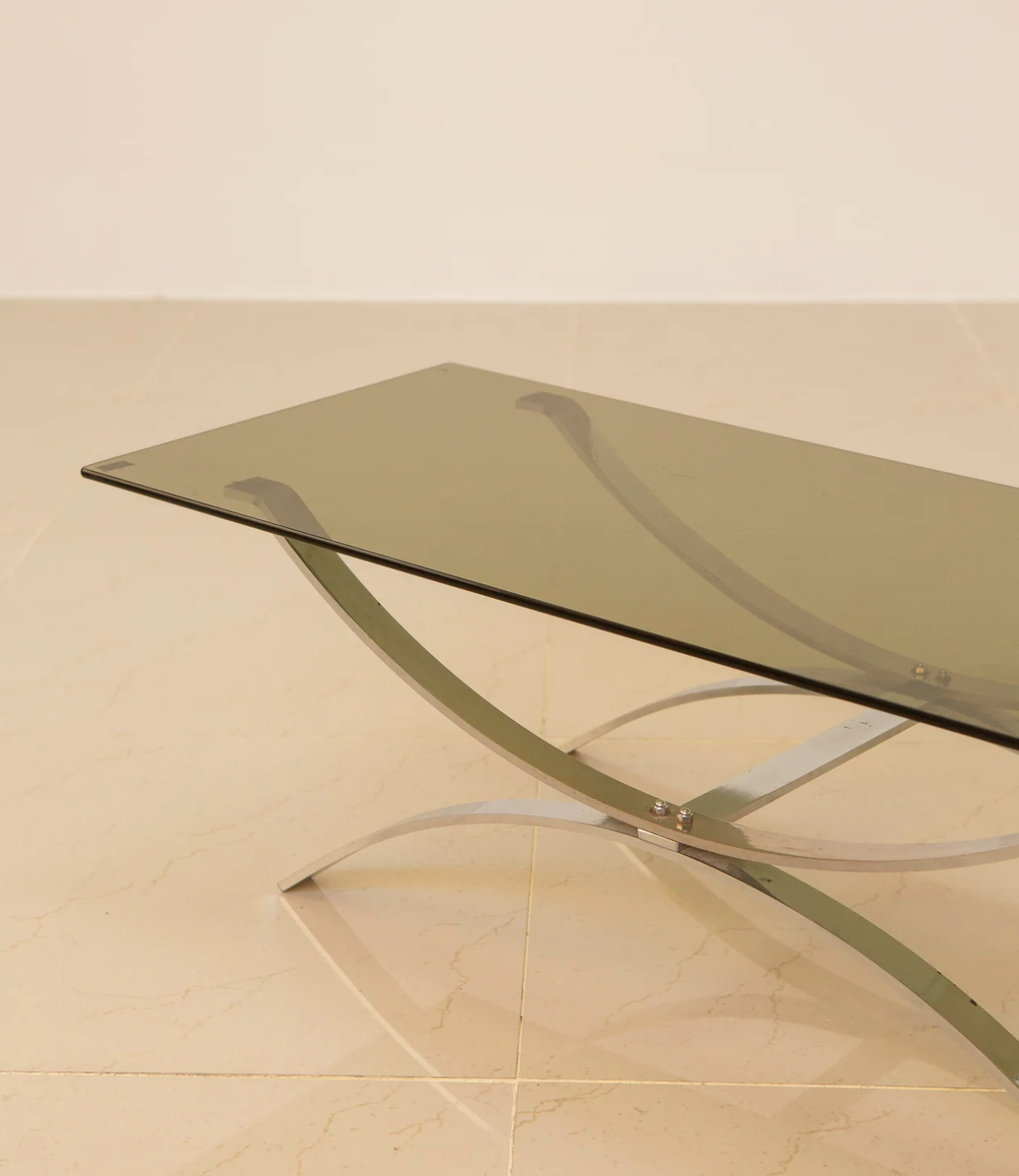 Full metal coffee table and its 70's smoked glass