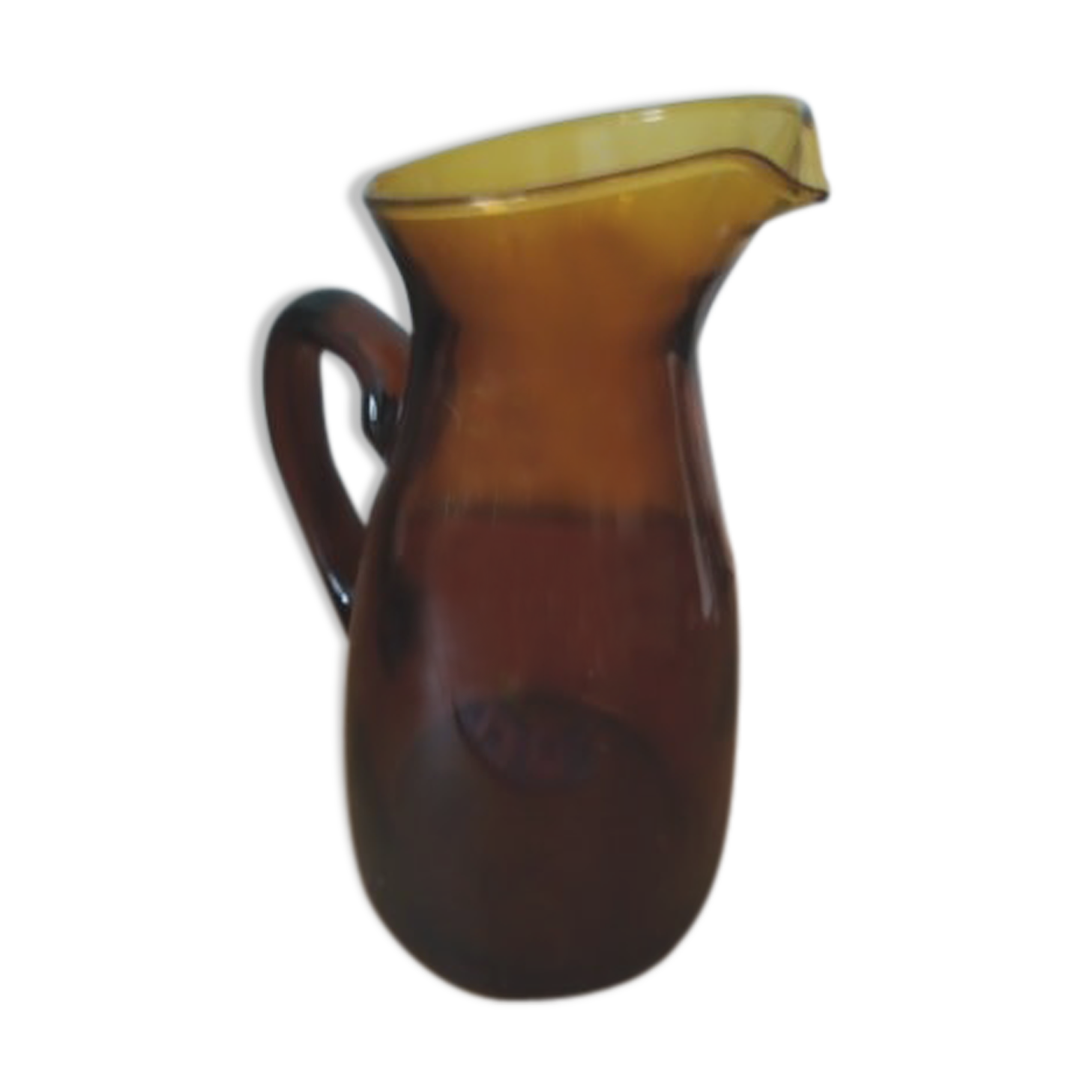 Vintage pitcher in amber glass