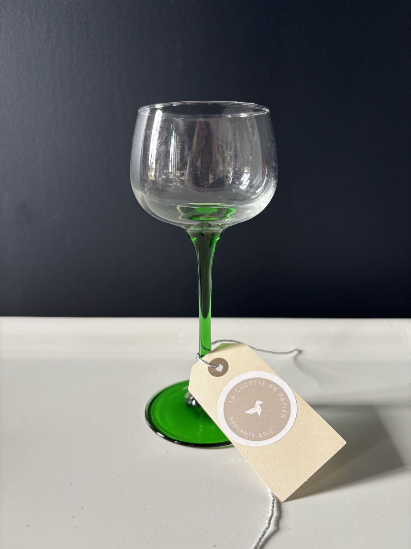 Set of 12 Alsatian Roemer glasses with green stems.