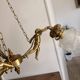 Golden bronze lustre with musical cherubs in vintage Louis XV style - lighting