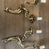 Pair of bronze wall lamps