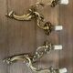 Pair of bronze wall lamps