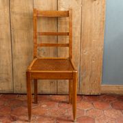 Lot de 4 chaises période Reconstruction bois massif