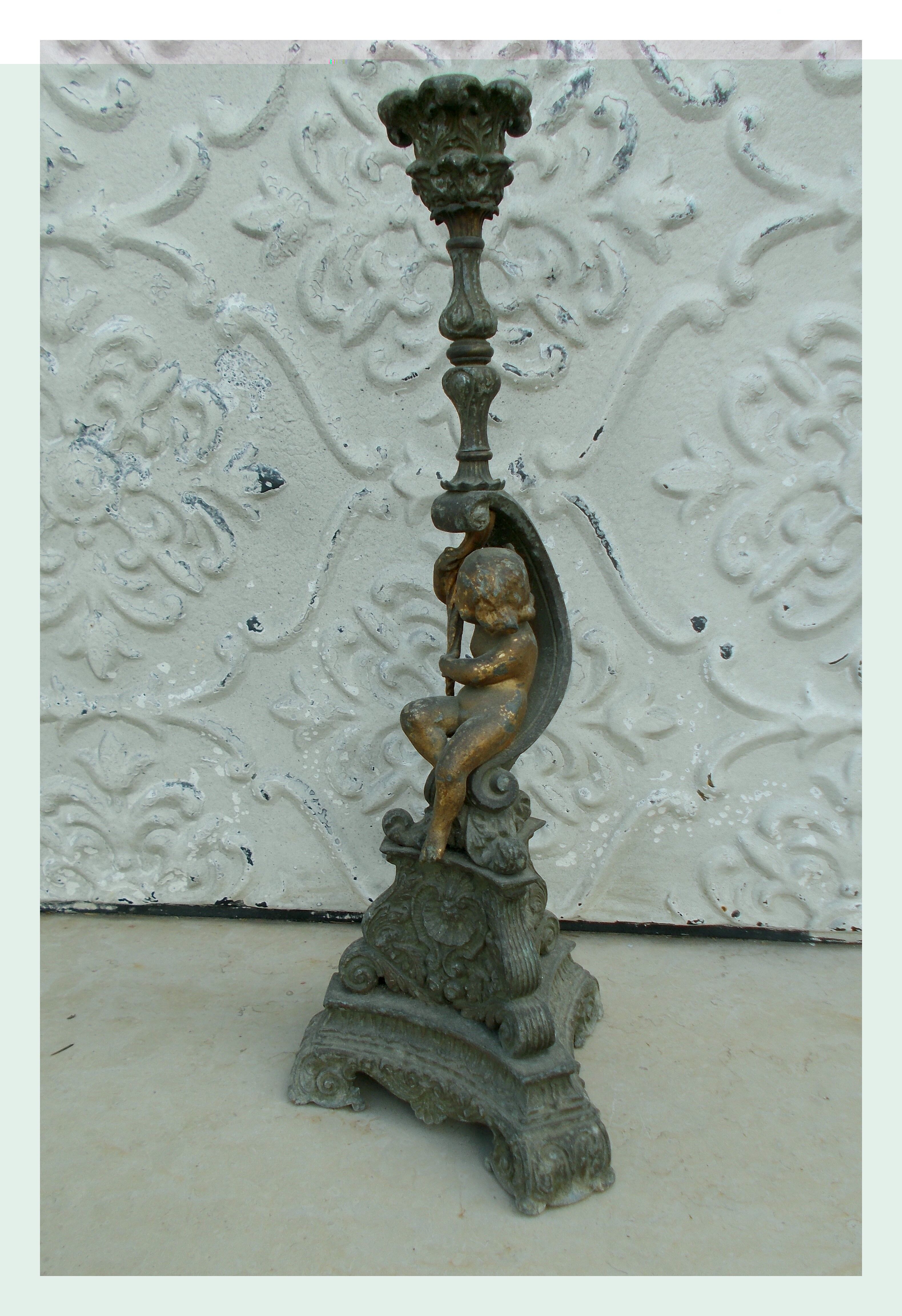 Bougeoir ancien putto regule