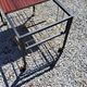 Coffee table from the 60s in black and gold metal tubes mahogany formica top