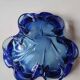 Large floral/corolla shaped pocket emptier