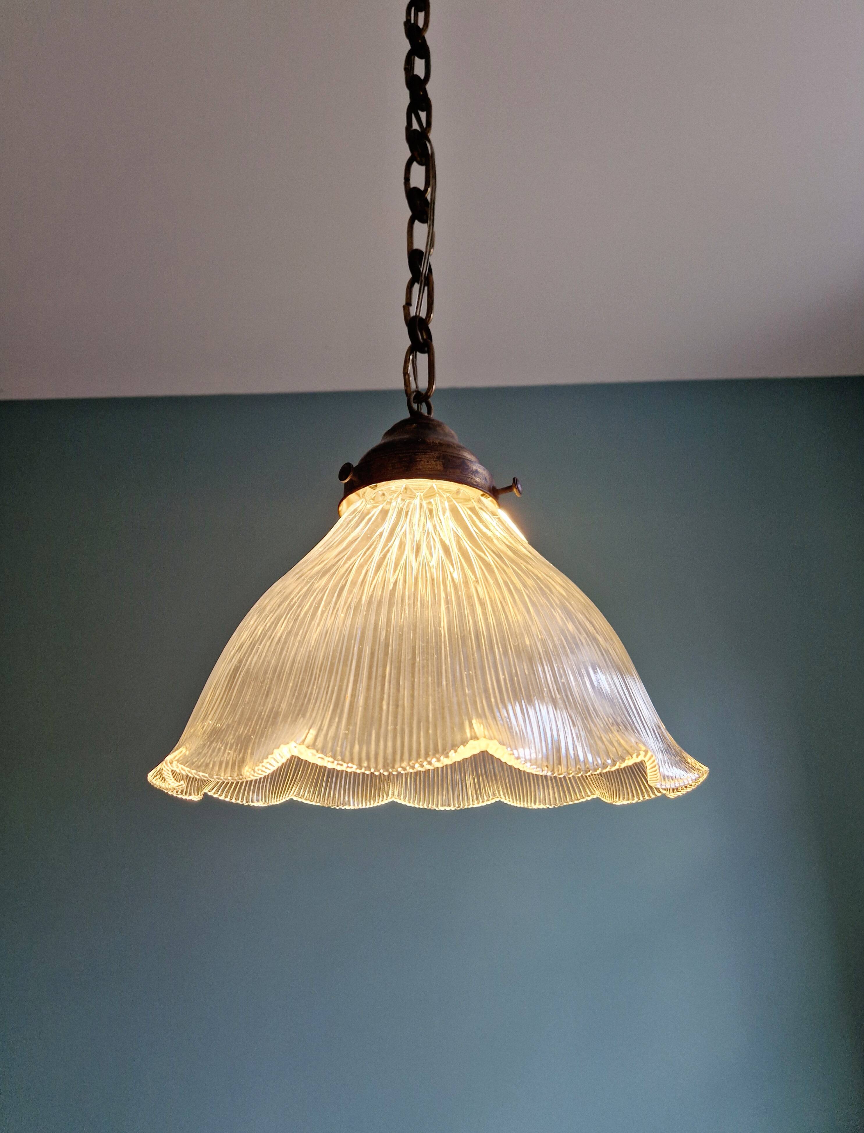 Large Holophane pendant light in transparent grooved glass