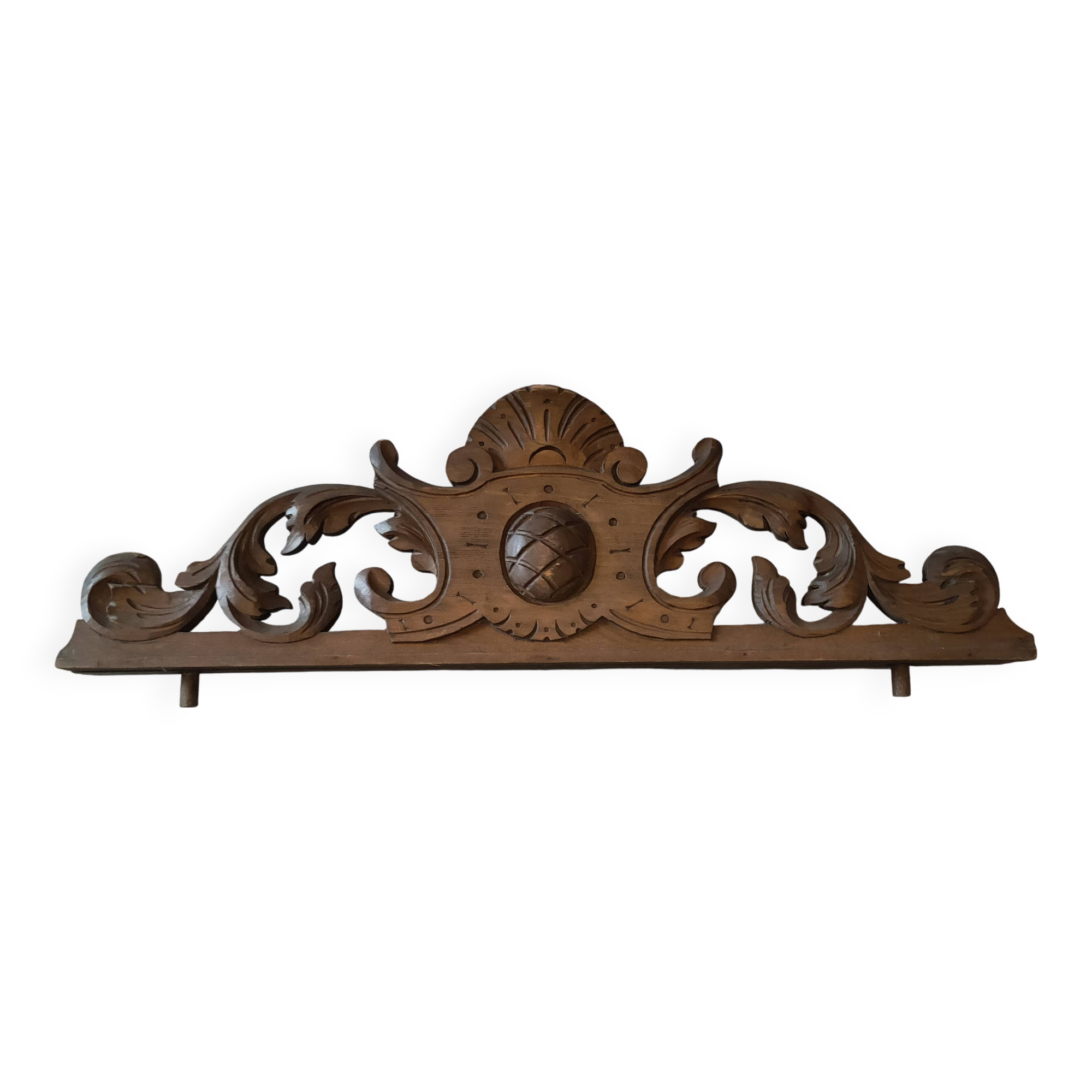 Old carved wooden pediment