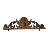 Old carved wooden pediment