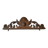 Old carved wooden pediment