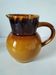 Glazed earthenware jug