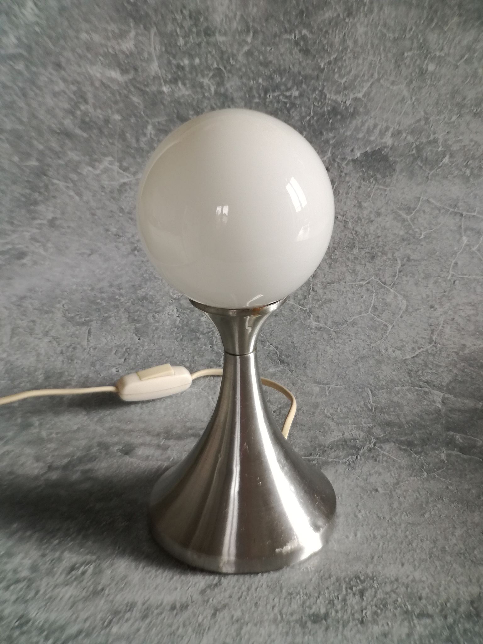 Brushed stainless steel and glass lamp from the 70s