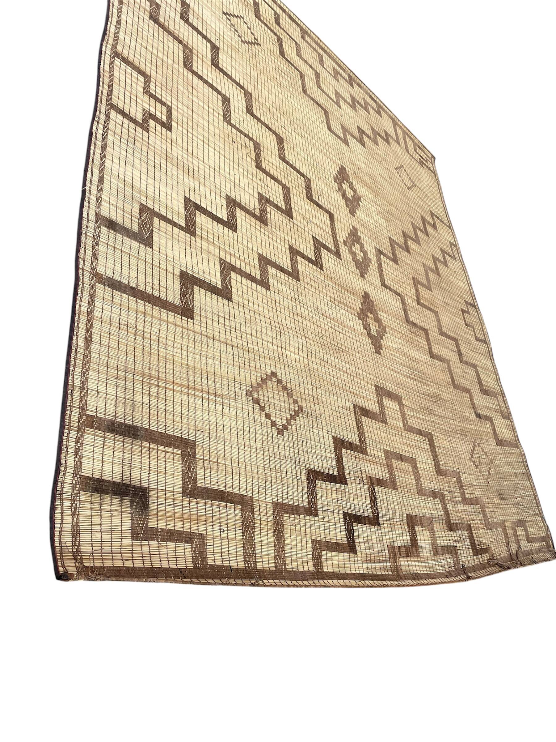 Vintage leather and reed Tuareg mat