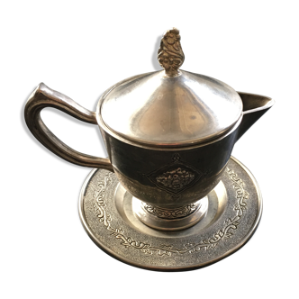 Pitcher and silver metal saucer