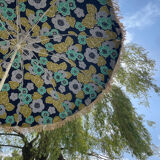 Blue parasol and flowers