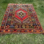 Old Moroccan carpet, made of natural wool and handwoven.