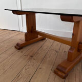 Pine coffee table with smoked glass top.