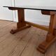 Pine coffee table with smoked glass top.