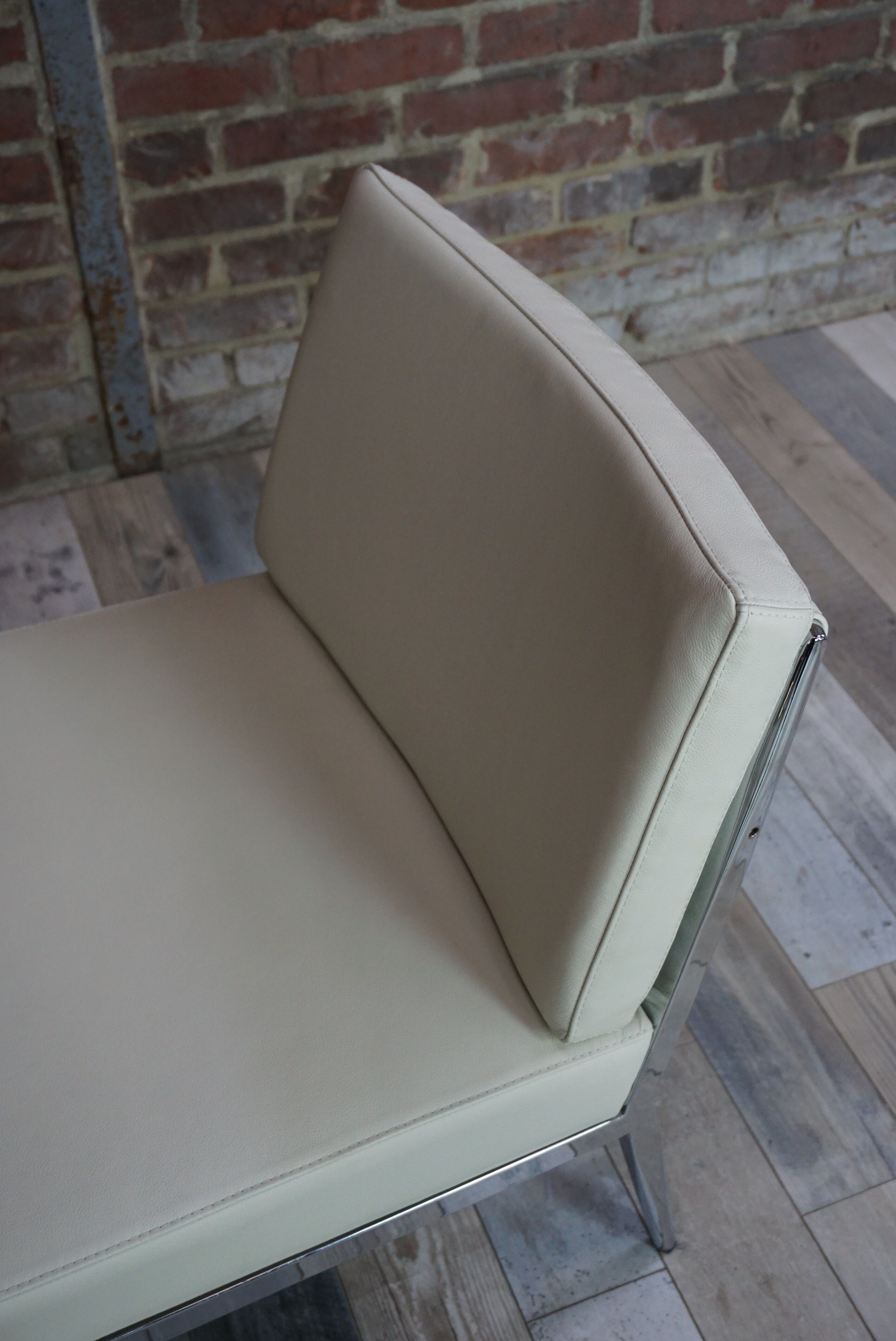 Pair of chrome and leather armchairs