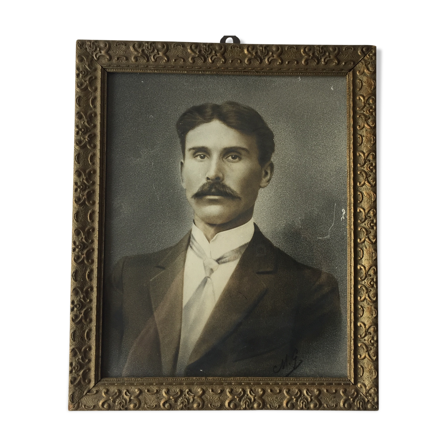 Authentic old photograph portrait of a handsome man with mustache 1920 - 1930