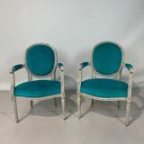 Pair of Louis XVI convertible armchairs