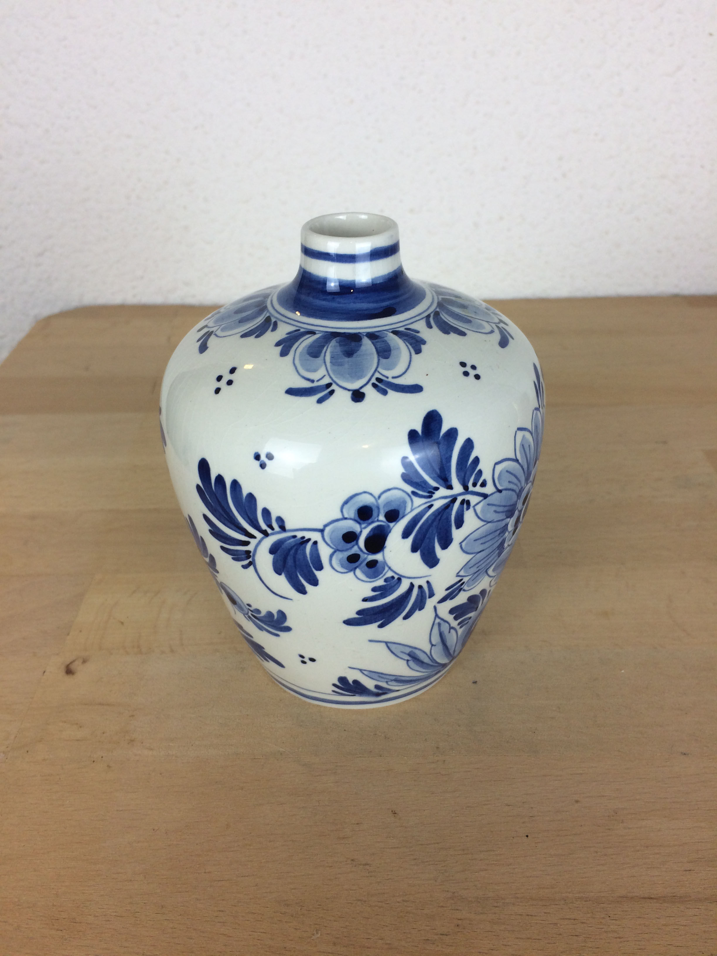 Delft earthenware vase with blue flowers